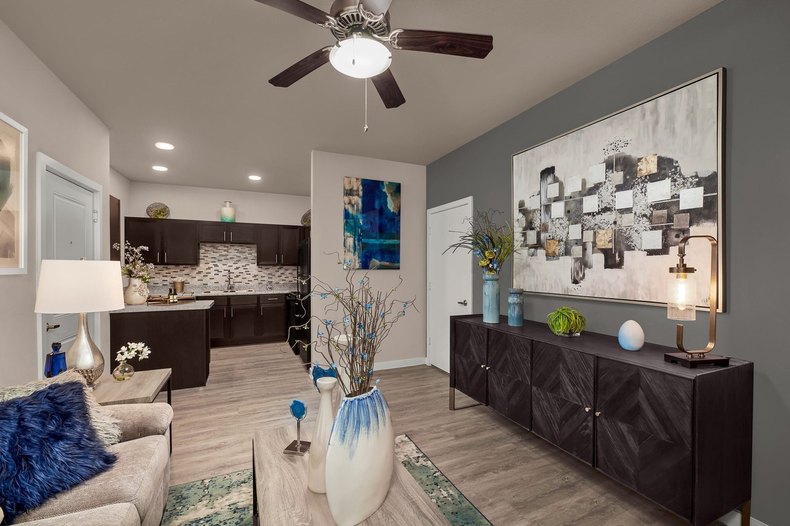 Soundstop acoustical flooring in a furnished multifamily unit with open kitchen