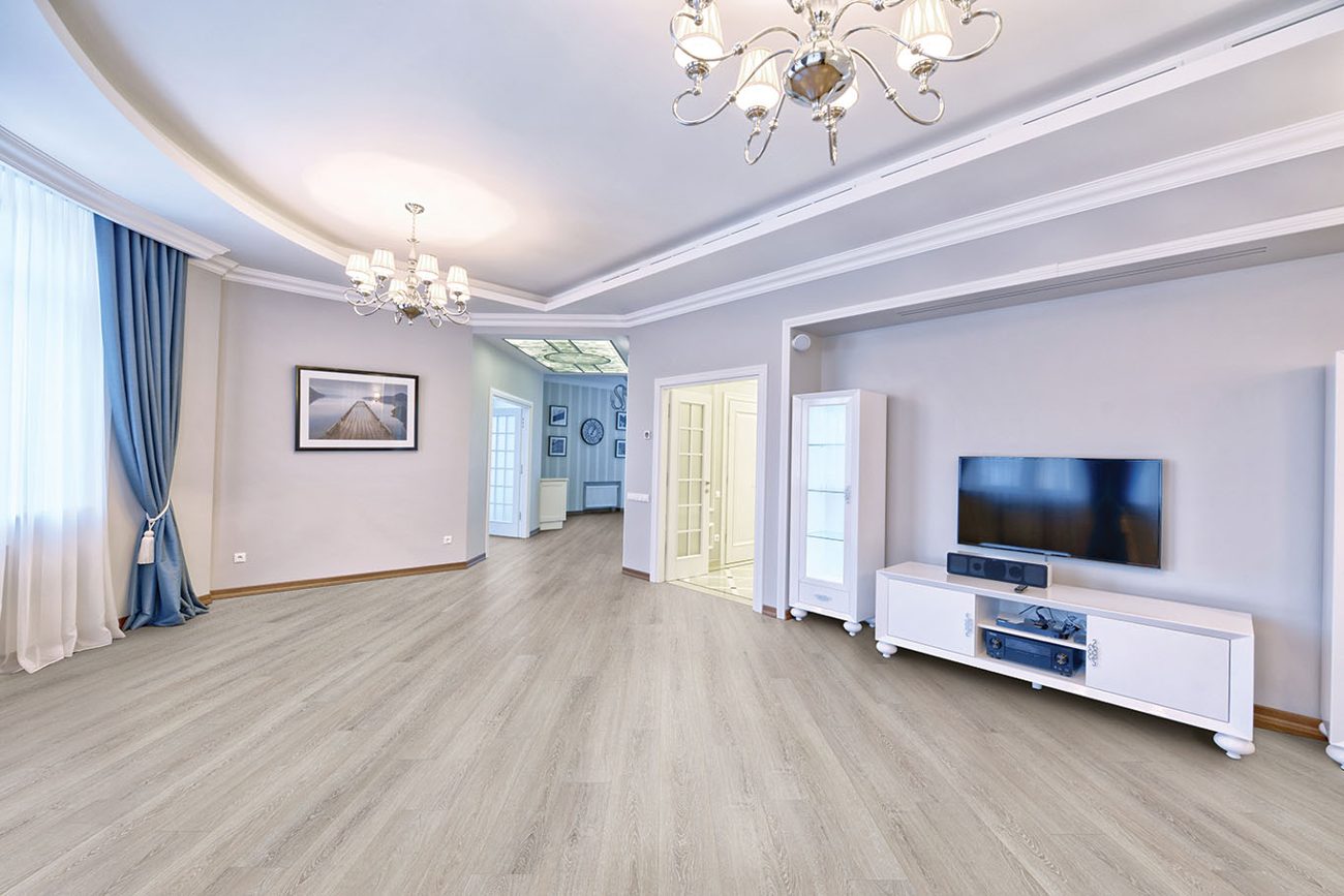 Light wood-look vinyl plank flooring in a bright open room
