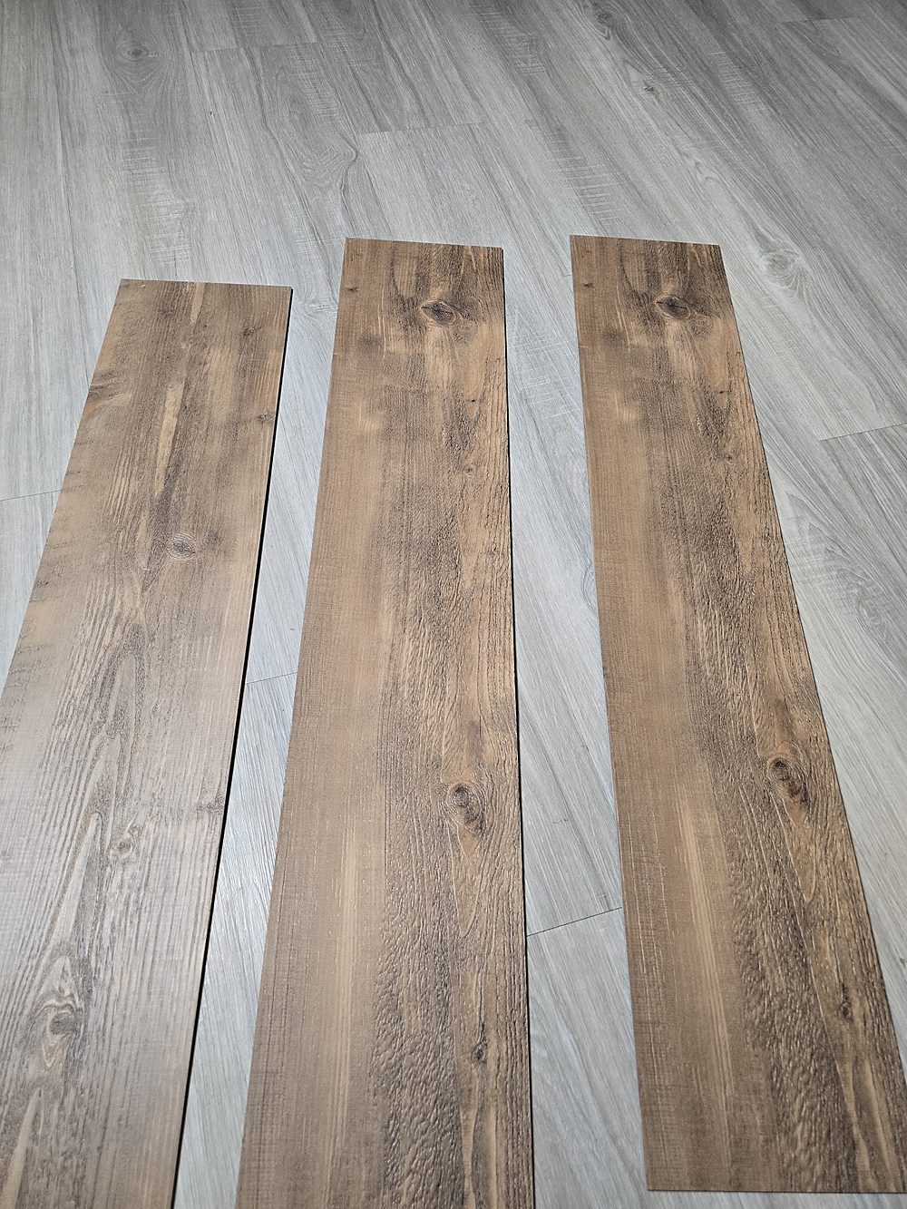 Three full-length Russett planks, 7.24 by 37.4 inches